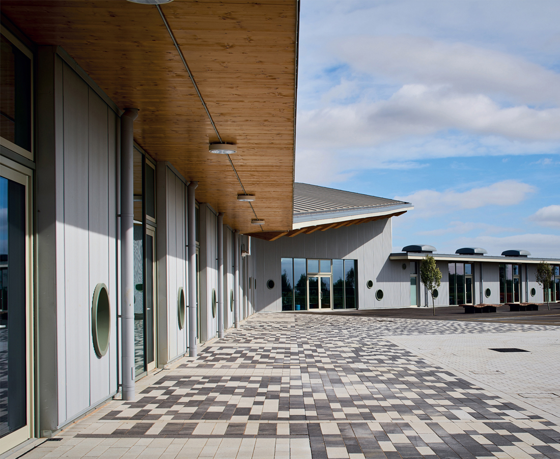 FIG 19.0 (chapter opener) CLT panels are exposed throughout this new school and form protective soffits externally (in turn, protected from weather and moisture).