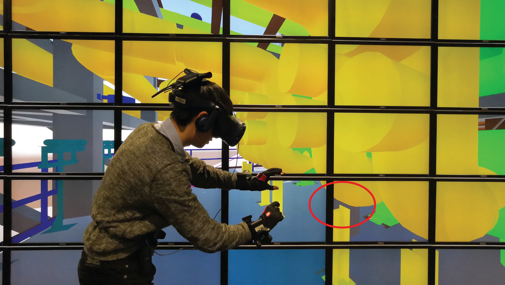 Photograph depicting a design review session in virtual reality for a missing support for a pipe spool.